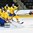 GRAND FORKS, NORTH DAKOTA - APRIL 23: Canada's Jordan Kyrou #25 makes a third period goal against Sweden's Filip Gustavsson #1 during semifinal round action at the 2016 IIHF Ice Hockey U18 World Championship. (Photo by Matt Zambonin/HHOF-IIHF Images)

